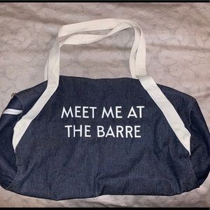 Medium sized denim duffle “MEET ME AT THE BARRE”
